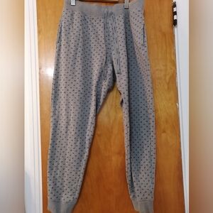 Calvin Klein Gray Joggers with Relaxed Fit and Soft Fabric. Black CK pattern